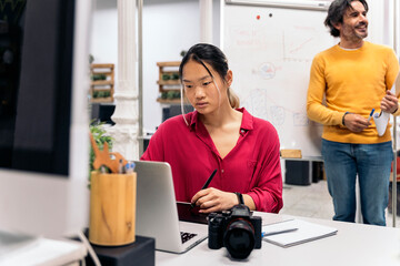 Asian Woman Working in Office