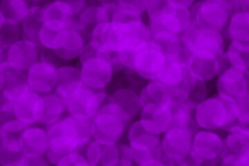 Purple violet bokeh background.  The concept of New Year, Christmas and all celebration concepts. 