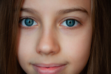 Obraz premium Portrait of a teenager. Close-up of the girl's face.