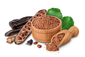 Carob pod and powder in wooden bowl isolated on white background with full depth of field.