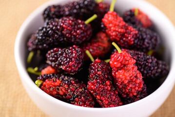 Fresh mulberry fruit in bowl, Healthy tropical fruit