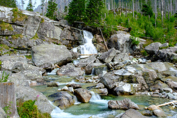 Naklejka na ściany i meble Waterfalls at stream Studeny potok in High Tatras mountains during summer, Slovakia