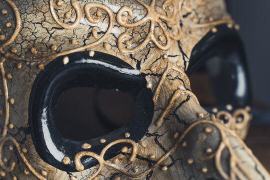 Venetian golden designed masquerade mask. Close up. High quality photo