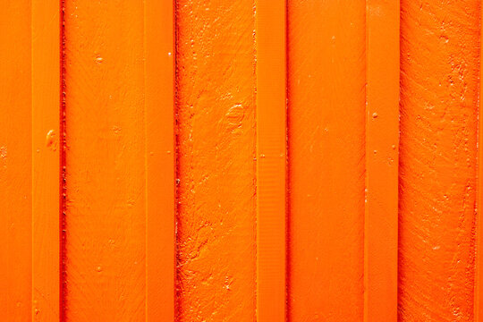 Orange Holzwand als abstrakter Hintergrund