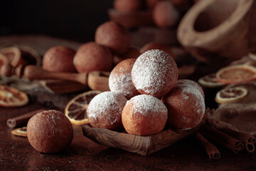 Cottage cheese doughnuts sprinkled with sugar powder.