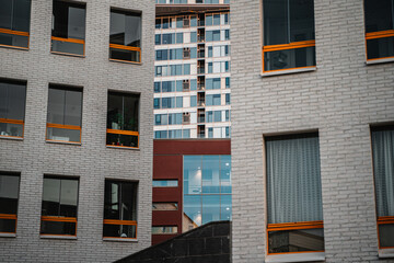 Layers of building exteriors with many windows