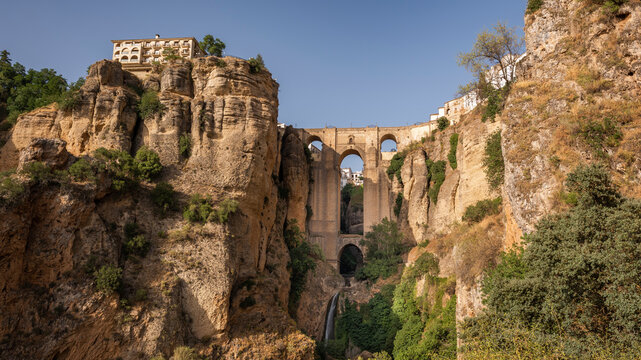 View of Ronda city, Malaga province, Andalusia, Spain. The Puente Nuevo "New Bridge" connects the two sides of the city by crossing the the Guadalev&iacute;n river canyon also known as El Tajo canyon.