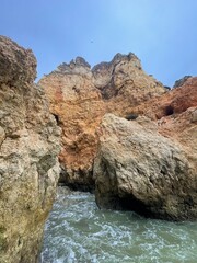 Praia Dona Ana beach Ponta da Piedade with turquoise sea water and cliffs, Portugal. Beautiful Dona Ana Beach (Praia Dona Ana) in Lagos, Algarve, Portugal Sunrise