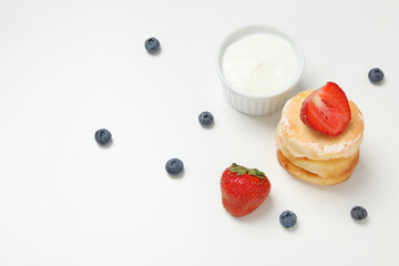 Concept of tasty sweet food, cheese pancakes, space for text