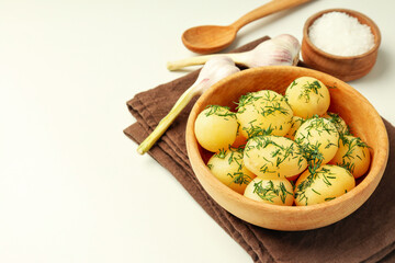 Concept of tasty food with boiled young potatoes, space for text