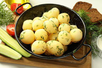 Concept of tasty food with boiled young potatoes, close up