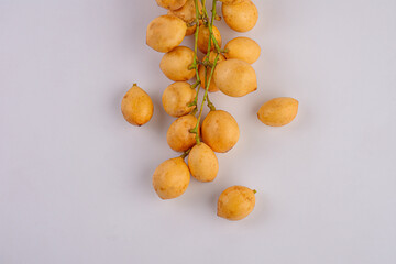 Mafai or Baccaurea ramiflora isolated on white background.Close-up