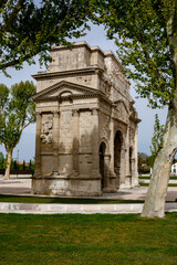 Fototapeta na wymiar View of the Roman triumphal arch of Orange, France