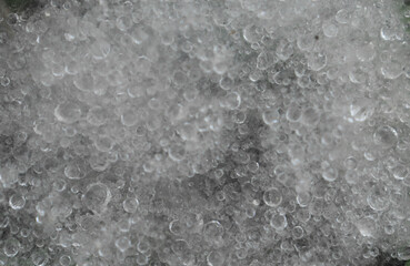 The texture of the cotton with the grains of water trapped in it