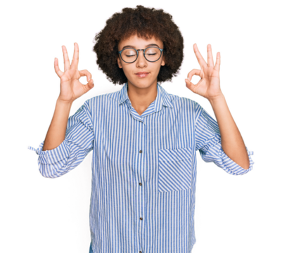 Young hispanic girl wearing business shirt and glasses relax and smiling with eyes closed doing meditation gesture with fingers. yoga concept.