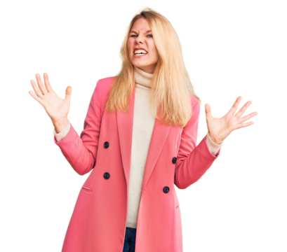 Young beautiful blonde woman wearing elegant clothes crazy and mad shouting and yelling with aggressive expression and arms raised. frustration concept.
