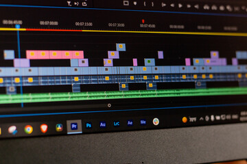 Editing videos on laptop, Premiere