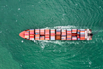 Fototapeta premium container vessels business and industry service export and import cargo by marine container vessels to distributing goods to consumers and supplier asia pacific and worldwide, aerial top view
