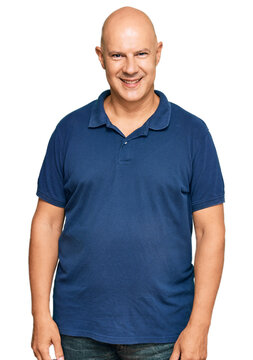 Middle age bald man wearing casual clothes with a happy and cool smile on face. lucky person.