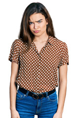 Fototapeta premium Young caucasian girl wearing casual clothes skeptic and nervous, frowning upset because of problem. negative person.