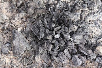 top view on coals ash and dust. extinguished fire