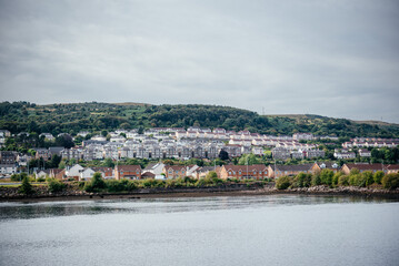 Fototapeta na wymiar A peaceful Scottish town by the Clyde river, beautiful landscape in Scotland, travel in Scotland