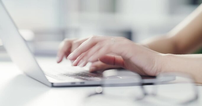 Hands, laptop and keyboard in timelapse or fast forward with a business woman working in the office at work. Female employee in a rush to complete a project in time for a deadline in the workplace