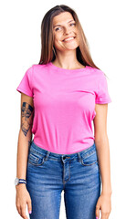 Beautiful caucasian woman wearing casual clothes with a happy and cool smile on face. lucky person.