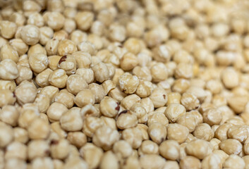 close up of roasted whole hazelnuts