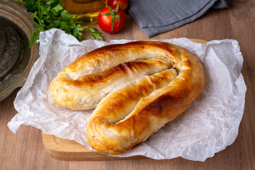 Turkish Kol Borek with minced meat serving