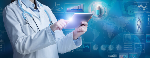 Fototapeta na wymiar Female doctor in white coat and stethoscope tapping on digital tablet in a scientific blue background with capsule, diagram, chart and infographics. Pharmaceutical industry research and development.