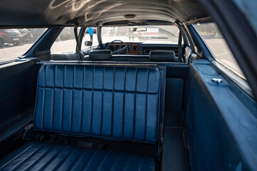 Classic long station wagon with wood-veneered doors, it's a blue