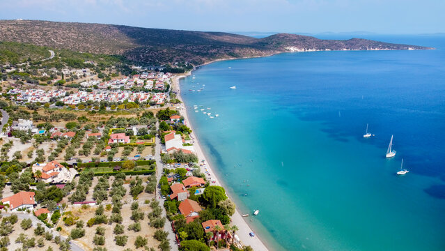 Manal Bay, which is connected to İzmir, is a peaceful and quiet resting area with its deep blue sea in Mordoğan Karaburun. Aerial view with drone. Izmir - Turkey