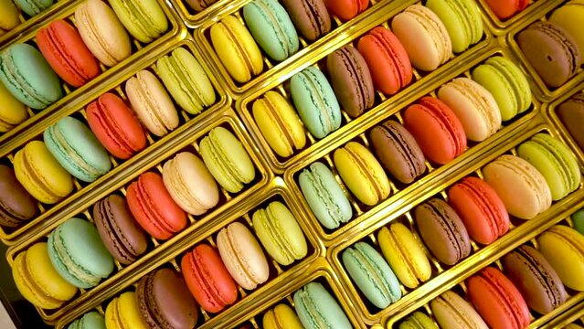 Top view macaroon slide. Rainbow macaroon footage.