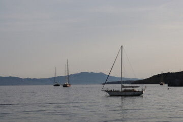 Fototapeta premium Evening, boats moored on the beach and calm sea.