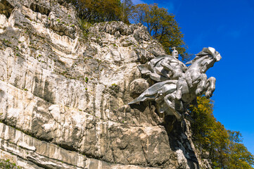 Monument on the mountain to the Holy Horseman in North Ossetia. The rider kills the dragon. The...