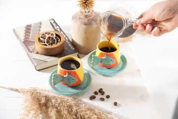 turkish coffee on the table with ceramic coffee cups and coffee beans