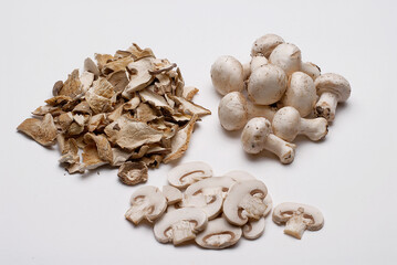 Mushrooms variety on white kitchen top table.
