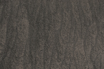 Fototapeta premium dark desert Sand texture on the beach