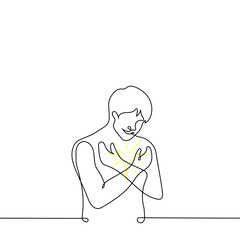 man saves the light coming from his chest - one line drawing vector. concept inner light, kindness, empathy, blessed or holy