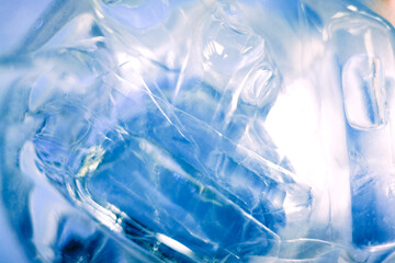 Effect blue color illustrations background Close up clear frost ice cube in glass, feeling cold