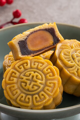 Delicious Cantonese moon cake for Mid-Autumn Festival food mooncake on gray table background.