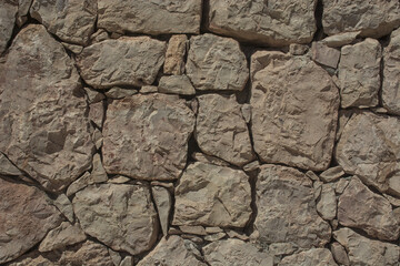 Wall closeup hand construction stones texture