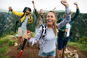Obraz na płótnie Canvas Group of happy friends enjoying outdoor activity together