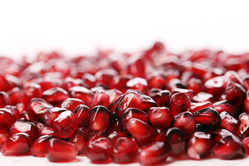 Exotic and delicious pomegranate on white background