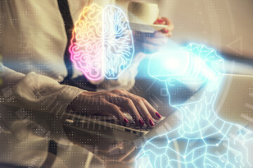 Double exposure of woman hands typing on computer and man in AR glasses drawing. Education concept.