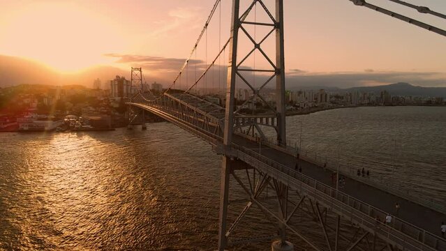 Hercilio luz cable bridge with sunset in Florianopolis, Brazil. Aerial view