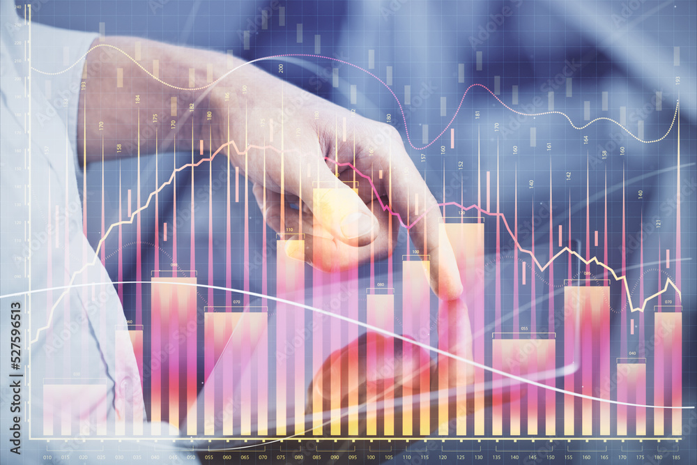 Aufkleber double exposure of man's hands holding and using a digital device and forex graph drawing. financial