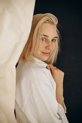 Fototapeta premium Young beautiful woman posing in studio
