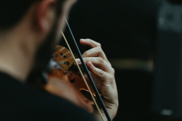Close up musician playing violin